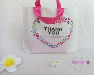 Guangdong custom die cut handle plastic shopping bags with your own logo