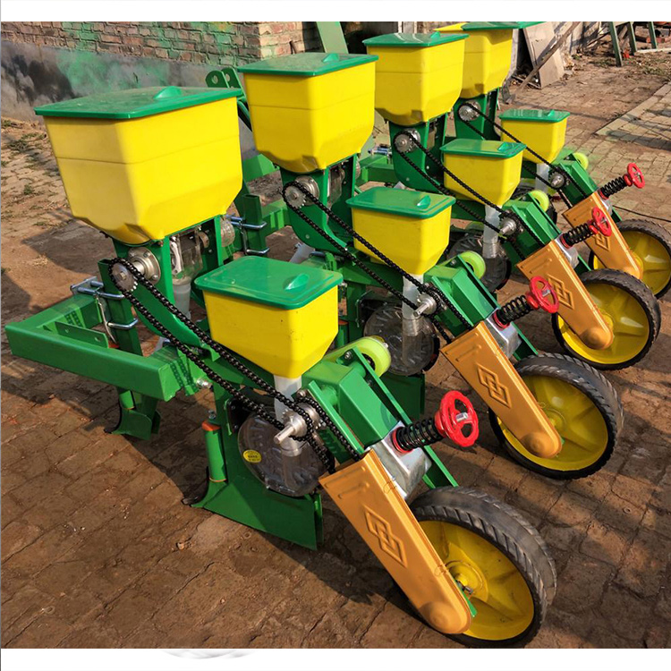 Tractor-installs-4-rows-of-corn-planters.jpg